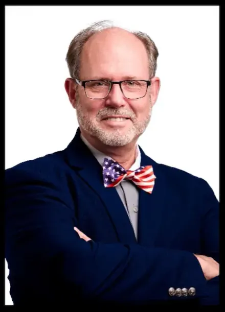 Portrait photograph of Dr. Douglas Frank, the featured speaker at the upcoming Dane County Elections presentation.